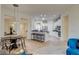 Spacious living area with an open layout, comfortable seating, and a view into the modern kitchen at 4845 Santo Romeo St, Las Vegas, NV 89135