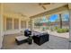 Cozy covered patio with comfortable seating, ideal for outdoor relaxation at 4845 Santo Romeo St, Las Vegas, NV 89135