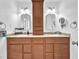 Bathroom featuring dual sinks, granite countertops, and updated fixtures at 4871 La Princesa Ct, North Las Vegas, NV 89031