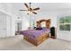 Bright main bedroom with ceiling fan and plenty of natural light at 4871 La Princesa Ct, North Las Vegas, NV 89031