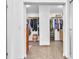 Spacious walk-in closet with ample storage and custom shelving at 4871 La Princesa Ct, North Las Vegas, NV 89031