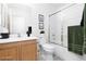 Bright bathroom features a vanity with sink and a shower-tub combination at 5043 Naff Ridge Dr, Las Vegas, NV 89131