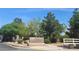Teton Trails Park entrance with lush greenery offers a welcoming community space for outdoor activities at 5043 Naff Ridge Dr, Las Vegas, NV 89131