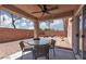 Cozy covered patio with outdoor dining set, perfect for relaxing at 5043 Naff Ridge Dr, Las Vegas, NV 89131