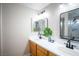 Bright bathroom features double sinks, modern fixtures, and decorative accents at 520 Arrowhead Trl # 1322, Henderson, NV 89015