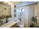 Chic bathroom featuring a shower-tub and trendy decor at 520 Arrowhead Trl # 1322, Henderson, NV 89015