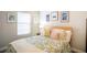 Relaxing bedroom featuring natural light, comfortable bedding, and stylish decor at 520 Arrowhead Trl # 1322, Henderson, NV 89015