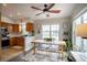 Eat-in kitchen features stainless appliances, a breakfast bar, and plenty of natural light at 520 Arrowhead Trl # 1322, Henderson, NV 89015