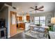 Cozy kitchen with wooden cabinets, stainless steel appliances, and a bright eating area at 520 Arrowhead Trl # 1322, Henderson, NV 89015