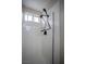 Tiled shower with dual shower heads and a window at 520 Arrowhead Trl # 1322, Henderson, NV 89015