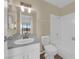 Bathroom with vanity, toilet and tiled shower/tub combo at 542 Grimsby Ave, Henderson, NV 89014