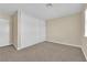 Bedroom features ample closet space, neutral walls, and plush carpeting at 542 Grimsby Ave, Henderson, NV 89014
