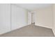 Comfortable bedroom boasting neutral walls, carpet flooring, and a closet at 542 Grimsby Ave, Henderson, NV 89014