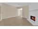 Spacious living room featuring a fireplace, tile flooring, and ample natural light at 542 Grimsby Ave, Henderson, NV 89014