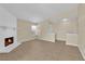 Inviting living room featuring a decorative white fireplace and tile flooring at 542 Grimsby Ave, Henderson, NV 89014