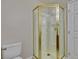 Bathroom features a toilet and standing shower with glass doors at 5424 Comchec Way # 105, Las Vegas, NV 89108