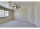 Spacious bedroom features a ceiling fan and a large window for great natural light at 5424 Comchec Way # 105, Las Vegas, NV 89108