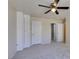 View of bedroom, with new carpet, closet, and entry to bathroom at 5424 Comchec Way # 105, Las Vegas, NV 89108