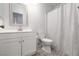 Bathroom with a white vanity, toilet, and shower-tub combination at 5528 Morningcross St, Las Vegas, NV 89130