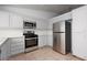 Modern kitchen with stainless steel appliances, stylish cabinetry, and ample counter space at 5528 Morningcross St, Las Vegas, NV 89130