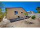 Backyard of home has new landscaping with clear skies for lovely views at 5548 Spearfish Lake Ct, Las Vegas, NV 89148