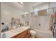 Bathroom featuring a tub-shower combo and vanity with sink at 5548 Spearfish Lake Ct, Las Vegas, NV 89148