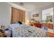 Bedroom with decorated comforter, dresser, and decor elements at 5548 Spearfish Lake Ct, Las Vegas, NV 89148