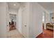 Hallway with tile flooring leading to bedroom and living areas at 5548 Spearfish Lake Ct, Las Vegas, NV 89148