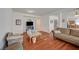 Cozy living room featuring hardwood floors and an open floor plan at 5548 Spearfish Lake Ct, Las Vegas, NV 89148