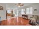 Open concept living room flowing into kitchen and dining area at 5548 Spearfish Lake Ct, Las Vegas, NV 89148