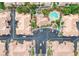 An aerial view showing the community pool and surrounding lush landscape in a well-maintained complex at 5855 Valley Dr # 1070, North Las Vegas, NV 89031