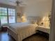 Bright bedroom with a large window and calming neutral tones at 5855 Valley Dr # 1070, North Las Vegas, NV 89031
