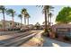 Inviting Jasmine Ranch community entrance with lush landscaping and well-maintained street view at 5855 Valley Dr # 1070, North Las Vegas, NV 89031