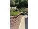 A well-maintained walkway through a lushly landscaped community at 5855 Valley Dr # 1070, North Las Vegas, NV 89031