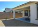 Covered patio for shade and low maintenance yard at 6432 Linden St, North Las Vegas, NV 89086