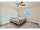 A clean bedroom with a window and neutral carpeting at 6432 Linden St, North Las Vegas, NV 89086