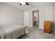 Neutral bedroom with carpet and ceiling fan at 6432 Linden St, North Las Vegas, NV 89086
