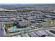 Aerial view of community with swimming pools, tennis courts, and dog park at 6432 Linden St, North Las Vegas, NV 89086