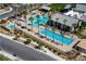 Aerial view of community pool and palm trees at 6432 Linden St, North Las Vegas, NV 89086