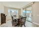 Bright dining room with sliding glass doors and a view of the outdoor patio at 6432 Linden St, North Las Vegas, NV 89086