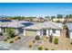 Well-kept single-story home with a tile roof, desert landscaping, and a paver driveway at 6432 Linden St, North Las Vegas, NV 89086