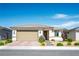 Charming single-story home showcasing a xeriscaped front yard with a paver driveway at 6432 Linden St, North Las Vegas, NV 89086