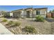 Charming single-story home featuring desert landscaping and an attached two-car garage at 6432 Linden St, North Las Vegas, NV 89086