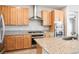 Kitchen featuring stainless steel appliances, granite counters, and light wood cabinets at 6432 Linden St, North Las Vegas, NV 89086