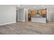 Open floor plan showcasing kitchen and living space at 6432 Linden St, North Las Vegas, NV 89086