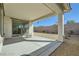 Covered patio overlooking the backyard with low-maintenance landscaping at 6432 Linden St, North Las Vegas, NV 89086