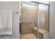 Bathroom shower with seat and chrome hardware at 6432 Linden St, North Las Vegas, NV 89086