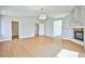 Spacious living room with open floor plan and fireplace feature at 6747 Gold Yarrow St, Las Vegas, NV 89148