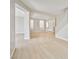 Bright and spacious living room featuring hardwood floors and neutral paint at 6747 Gold Yarrow St, Las Vegas, NV 89148