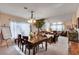 Open-concept dining room seamlessly connects to the living area, perfect for entertaining and Gathering gatherings at 7109 Deepriver Cir, Las Vegas, NV 89129